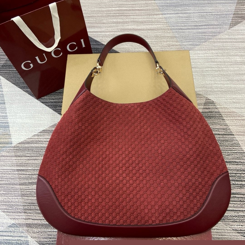 G*u*i top handle bags